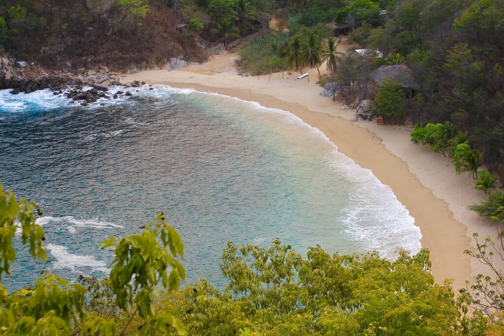 The view of Playa Boquilla from the hillside to the east of Casa Ivan (located center frame)