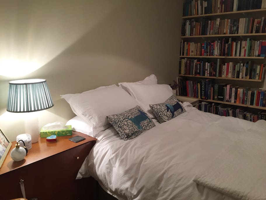 Double bedroom with plenty of reading material