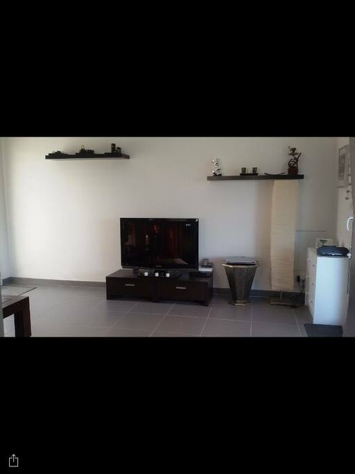 Séjour avec TV écran Plat + wifi