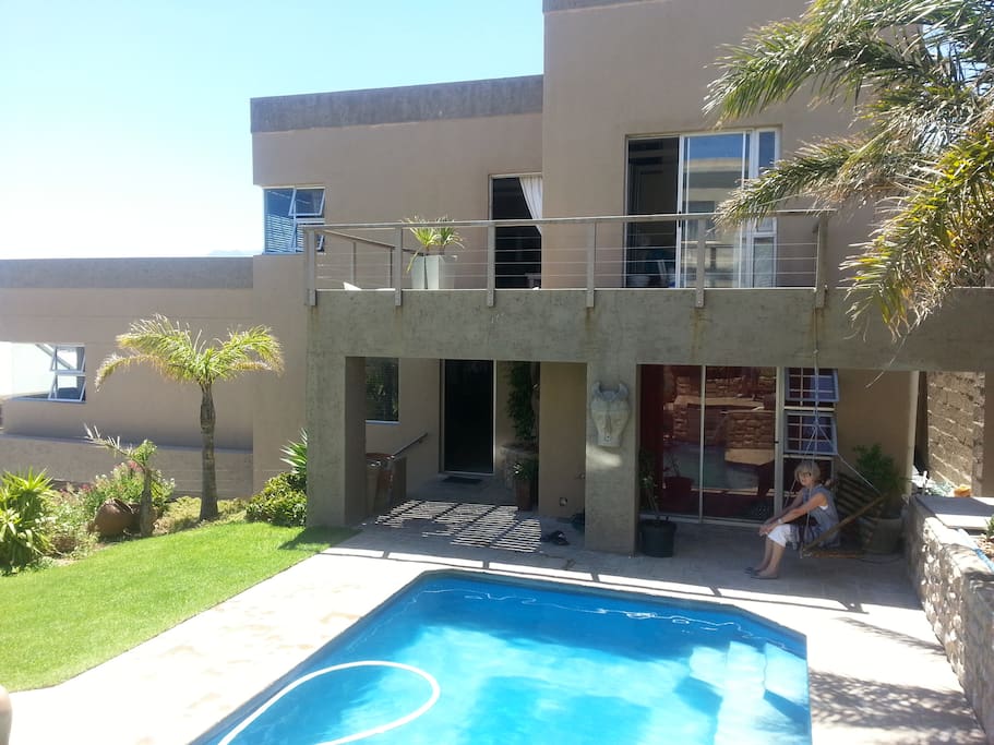 Large swimming pool and patio area.