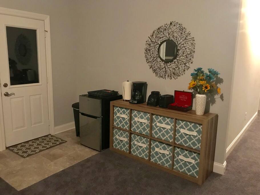 Private entrance with private mini kitchen, which includes a fridge, coffee maker, coffee, tea, waters and most common kitchen utensils. Access to main, shared, kitchen is available as well