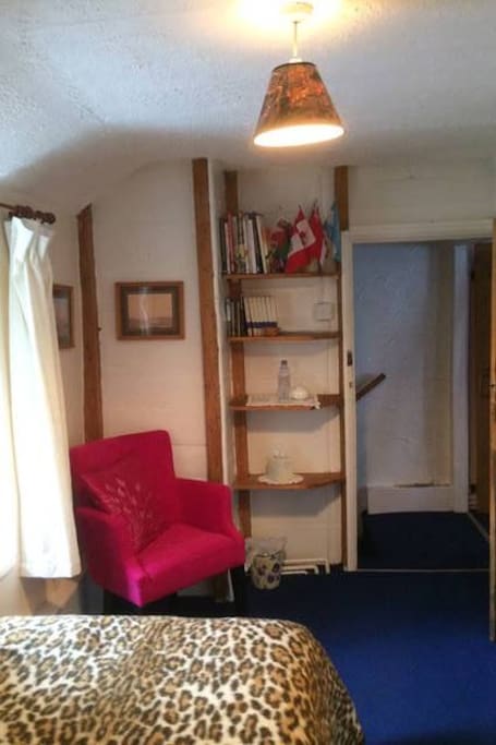 Storage space and seat to relax on in the single room