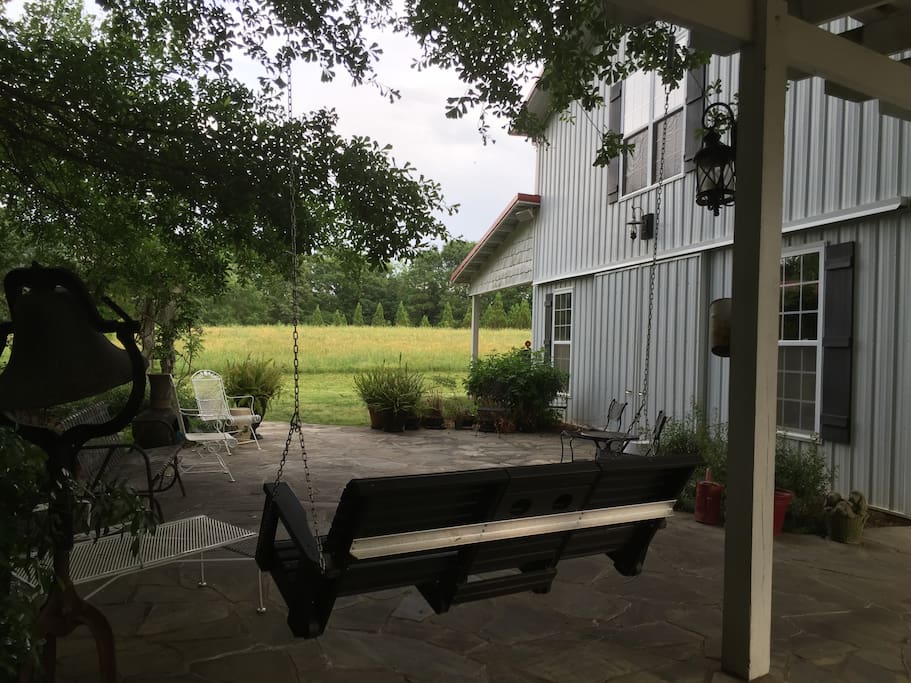 Enjoy the late afternoons with a glass of wine in the swing.