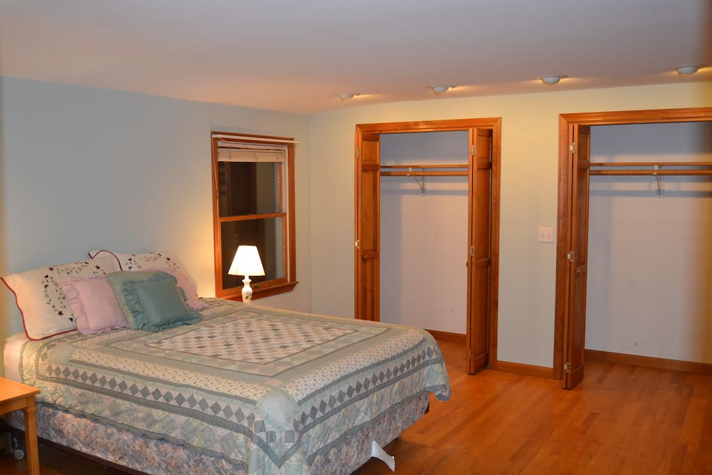 Large master bedroom with Queen bed space for crib or air mattress