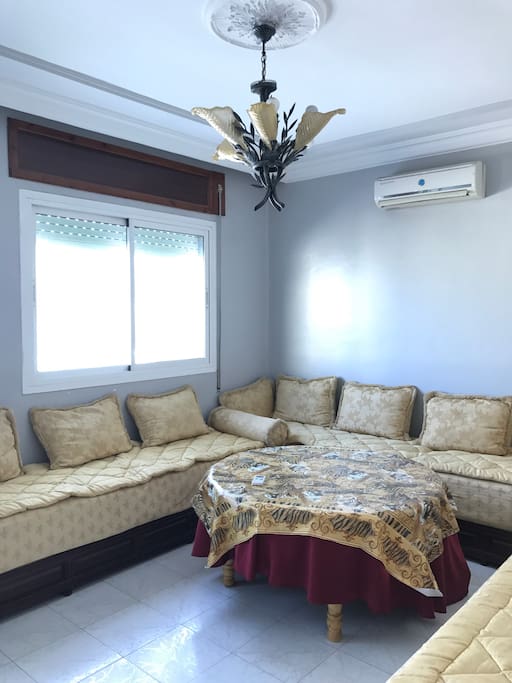 Living room with A/C and a view of the harbour