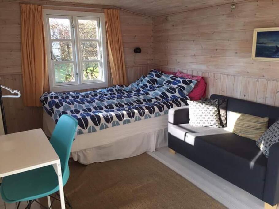 Queen sized bed, sofa and table with chairs