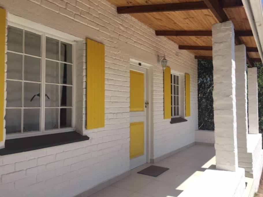 Classic crofter's cottage facade with large modern interior. Large outside wooden deck and braai area and large garden.
