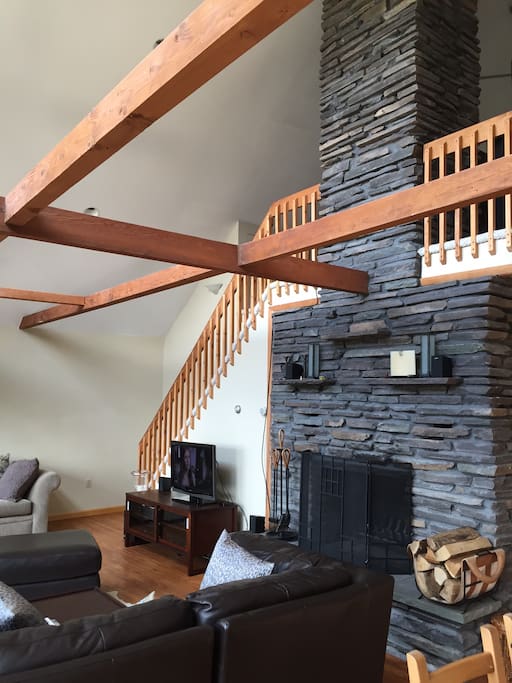 Two story wood burning fireplace.