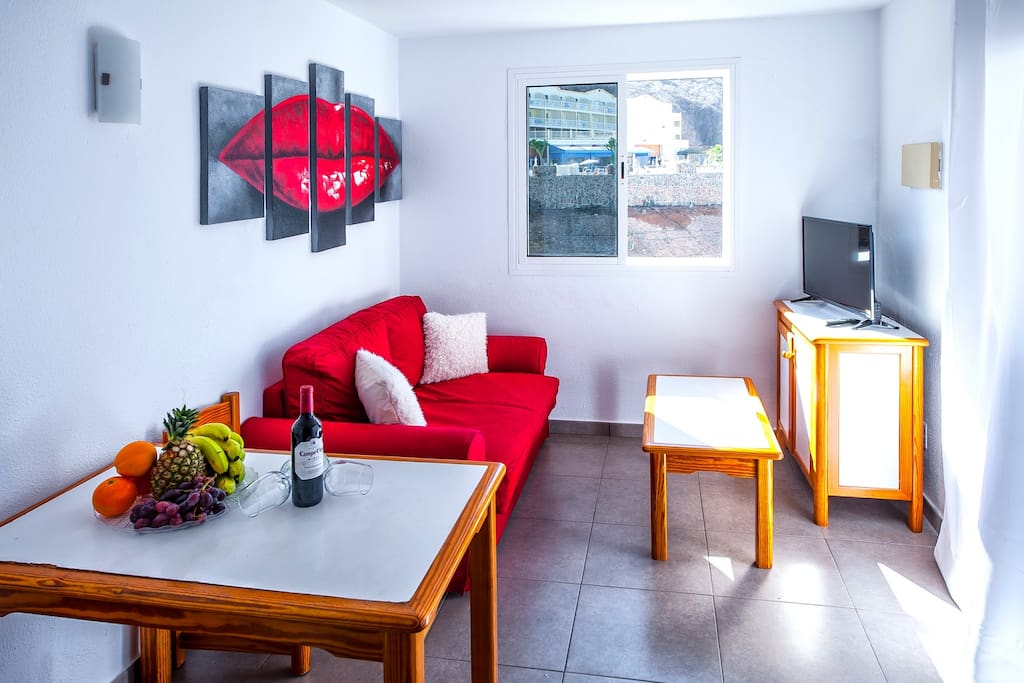 Living Room with Sofa Bed TV