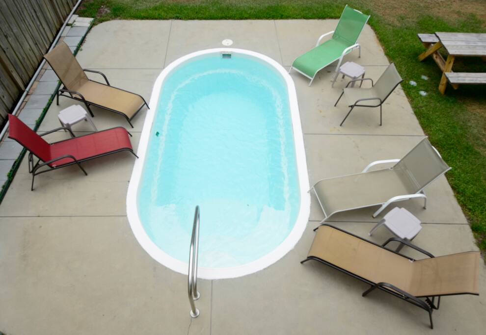 Private pool with 6 foot privacy fence