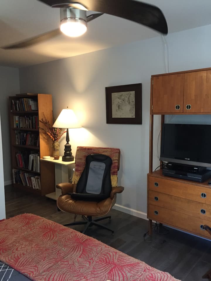 Reading chair and books.