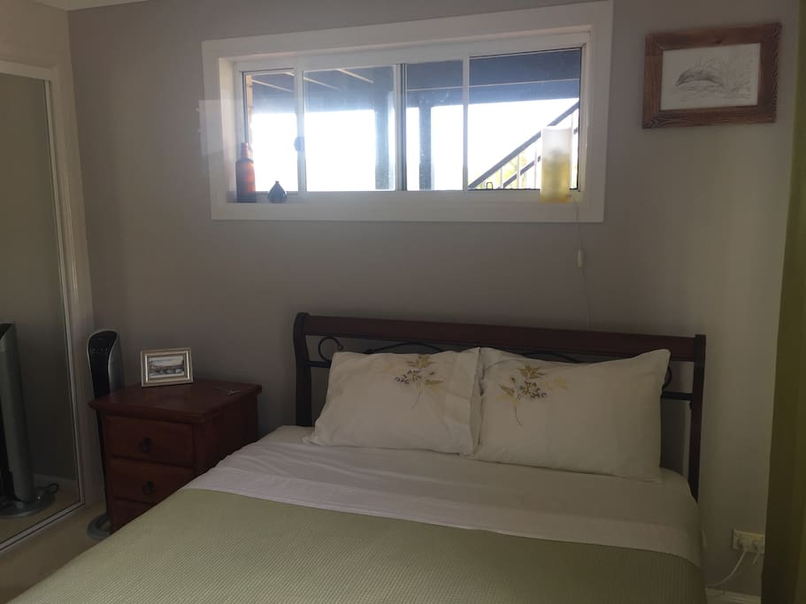 Your room with Queen bed and built in.