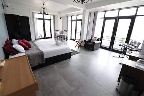 The Spacious Gray Room