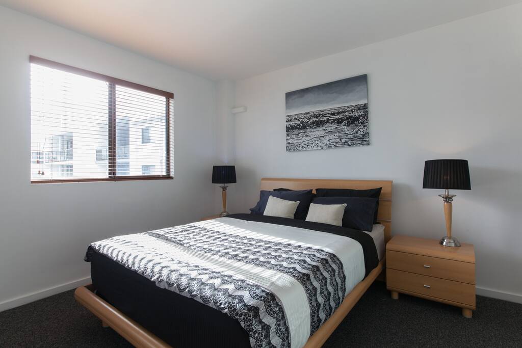 Master bedroom with queen bed, ceiling fan, built in robes and ensuite.