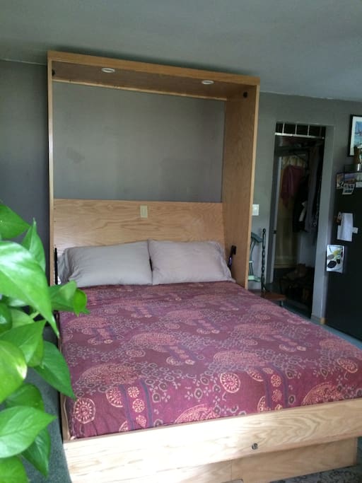 The comfy queen-sized murphy bed