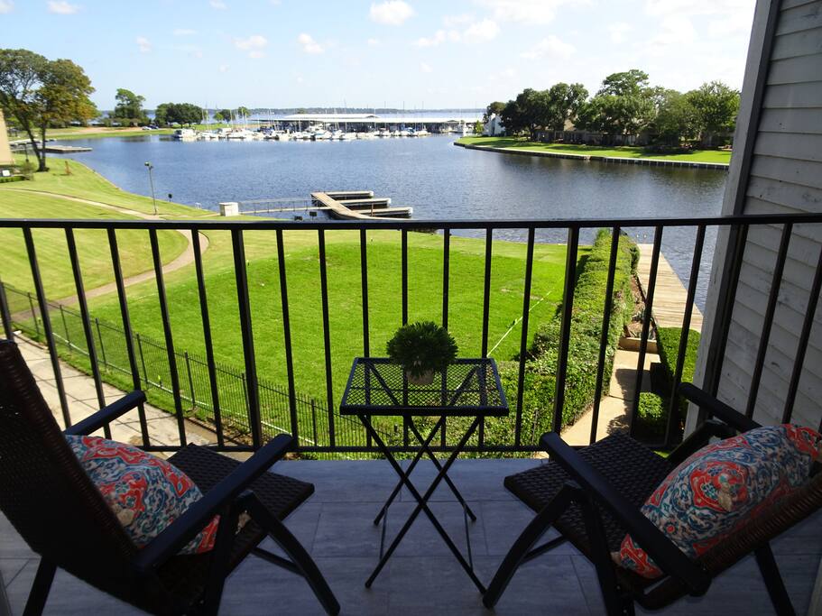 Stunning view from the third floor balcony, onto the bay, marina and Lake Conroe