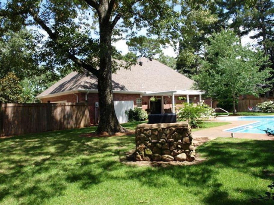 Relax in the backyard and enjoy grilling out or swimming.