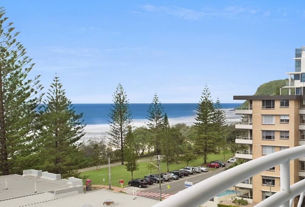 Relax with a drink while watching the world go by on the balcony