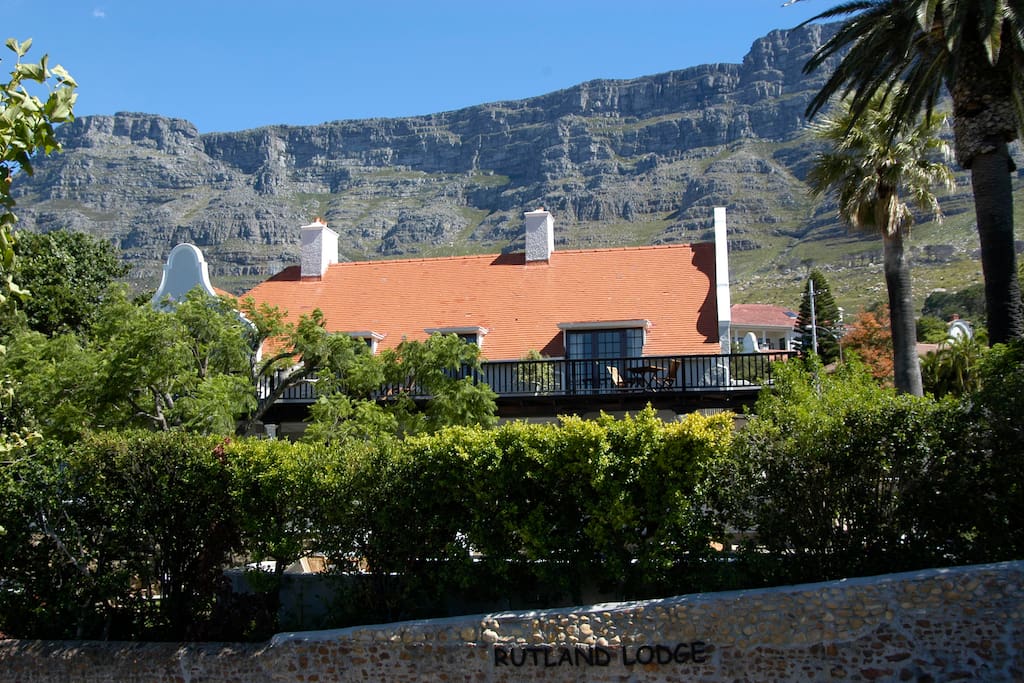 This 1904 Herbert Baker Cape Dutch Manor House is located on a quiet tree-lined street on the slopes of Table Mountain overlooking the city of Cape Town and Table bay.