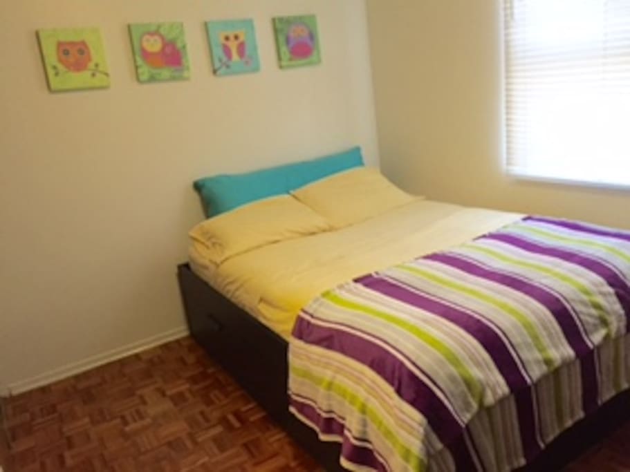 Bedroom. Queen size bed. The room has closet and a 6-drawer dresser