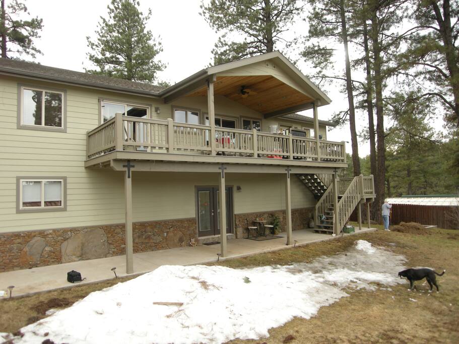 Rear of home. The entrance to the cottage is the door on the lower level.