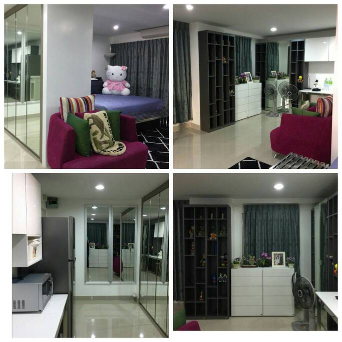 Super big wardrobes colorful sofa , long working desk and fully home entertainment unit.