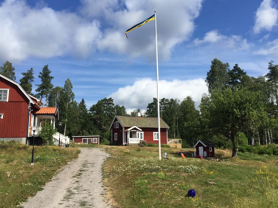 Cottage to the right and the main house to the left where the host family live.