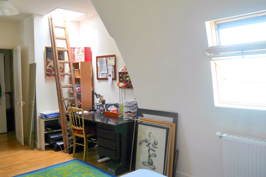 The bedroom, the desk corner. You can also go up to the roof with the ladder and enjoy the view (at your own risk).