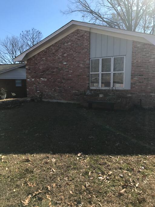 Additional view of front. Beautiful planter of flowers in Spring.