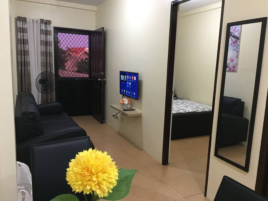 living area, with bedroom 1 view