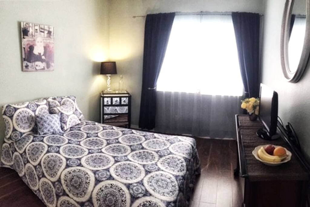 Bedroom has a comfy full size bed.