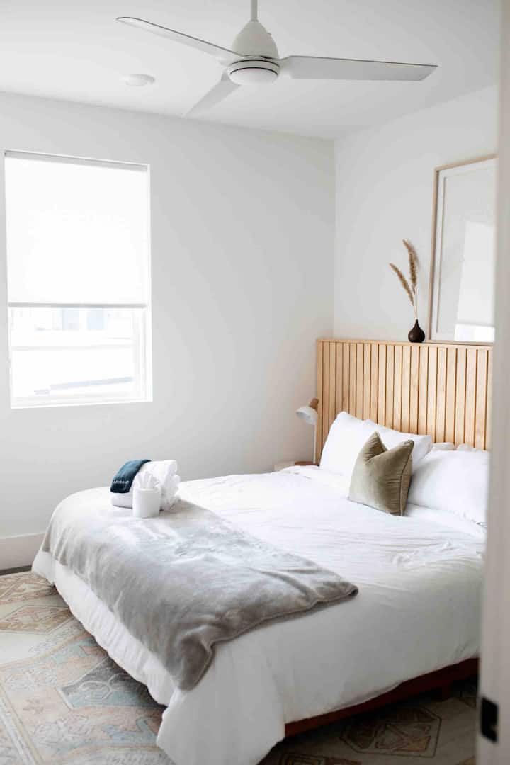 First floor bedroom with a Helix King mattress with cooling technology. En suite bathroom, closet, and 50 inch TV. 