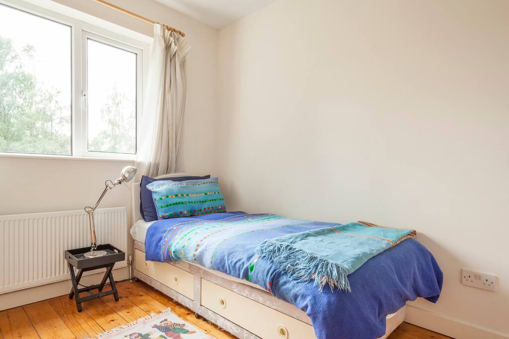 Bedroom 1: Single Bed with storage