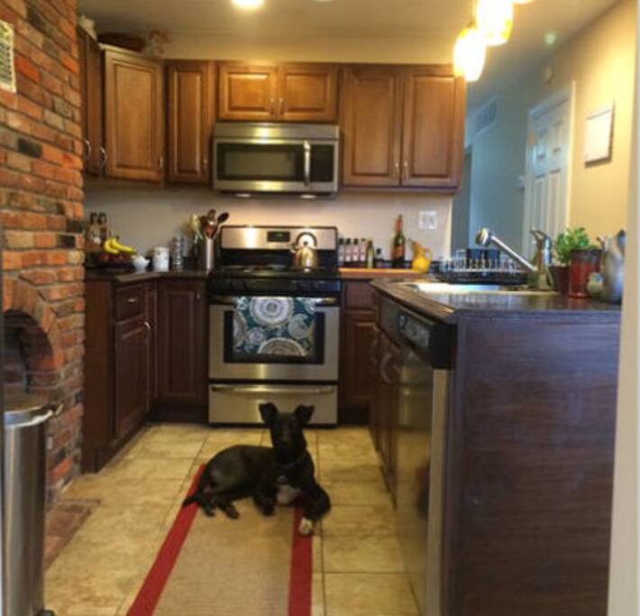 Amia welcomes you into the kitchen!