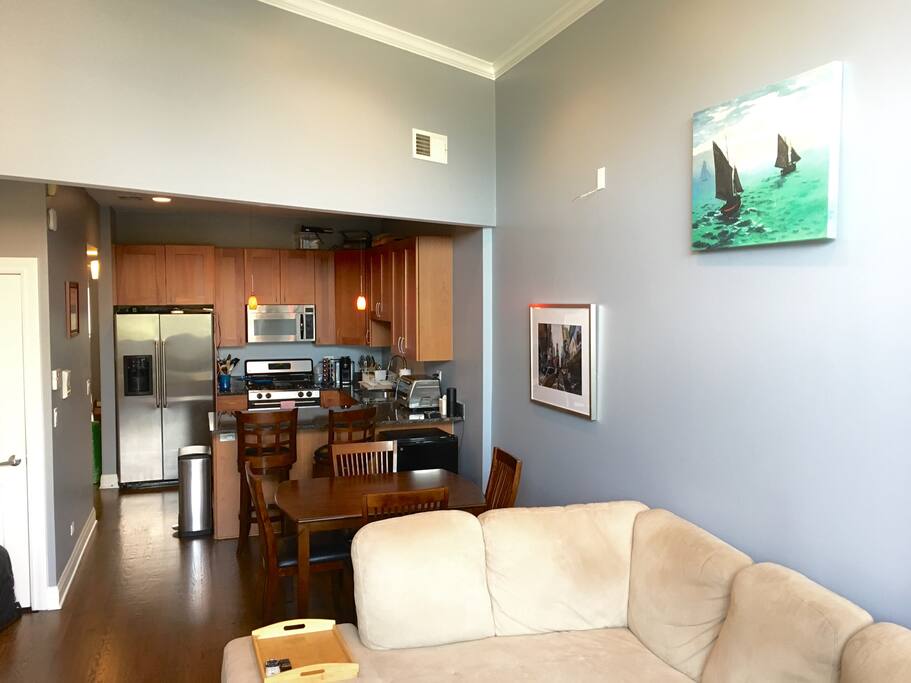 Loft like living room, dining room, kitchen makes for an amazing place to hang out and entertain!