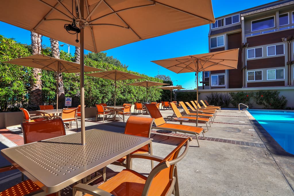 Grab a lounge chair or dine on the community patio.