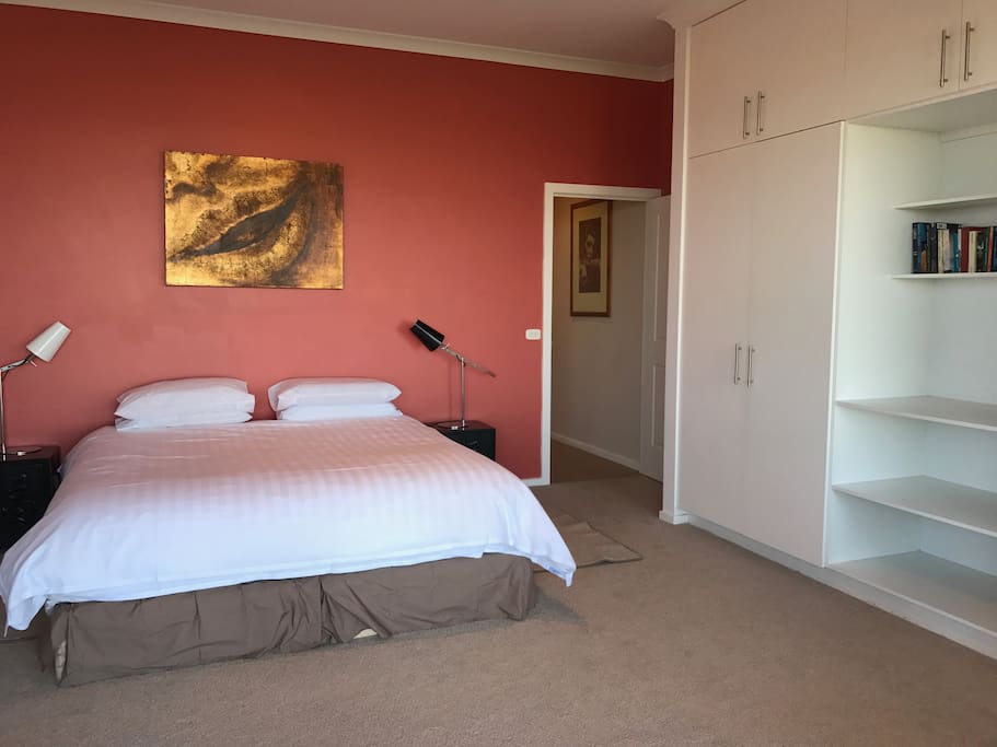 Large spacious bedroom with spectacular views