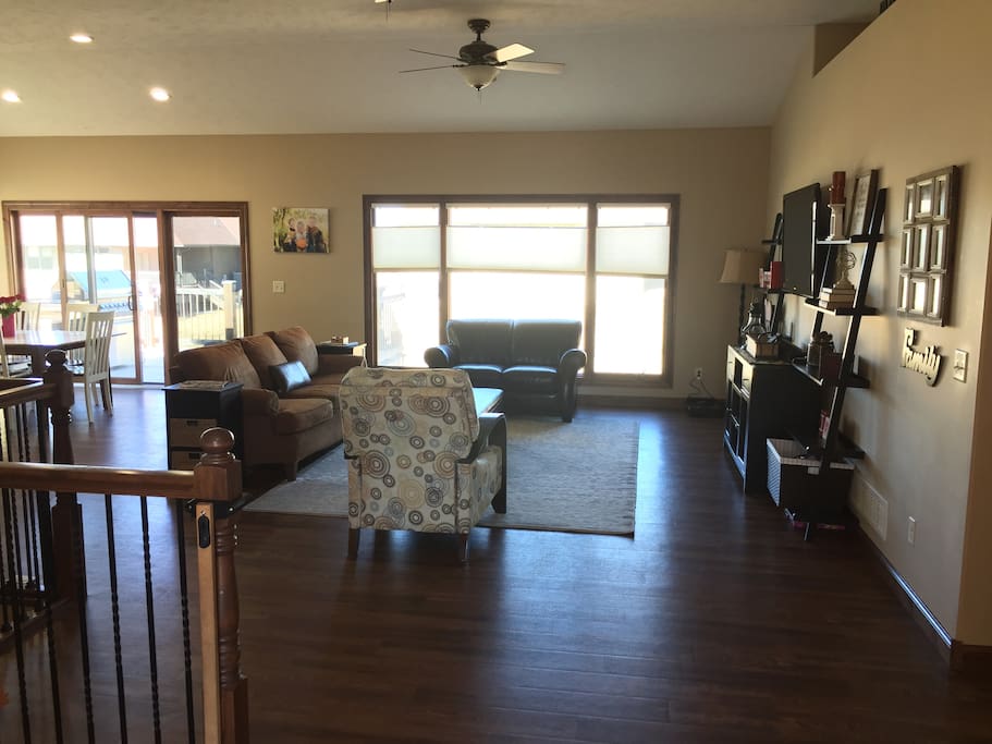 Large living spaces, picture windows and a small deck.