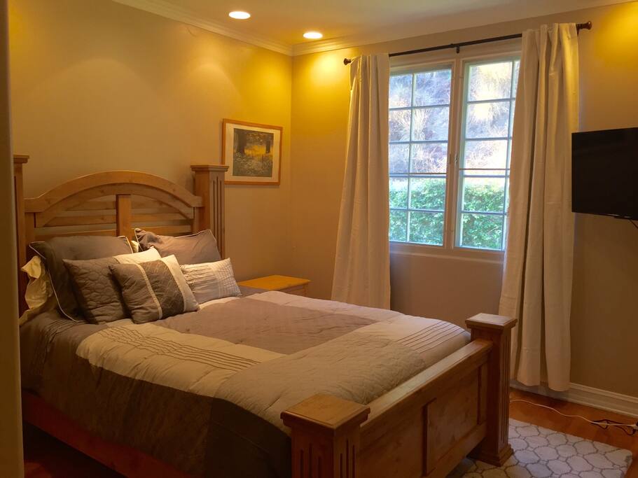 Here is your gorgeous, impeccably clean room, with your own flat screen TV, and your own personal ensuite bathroom. And beautiful green views out of your window.