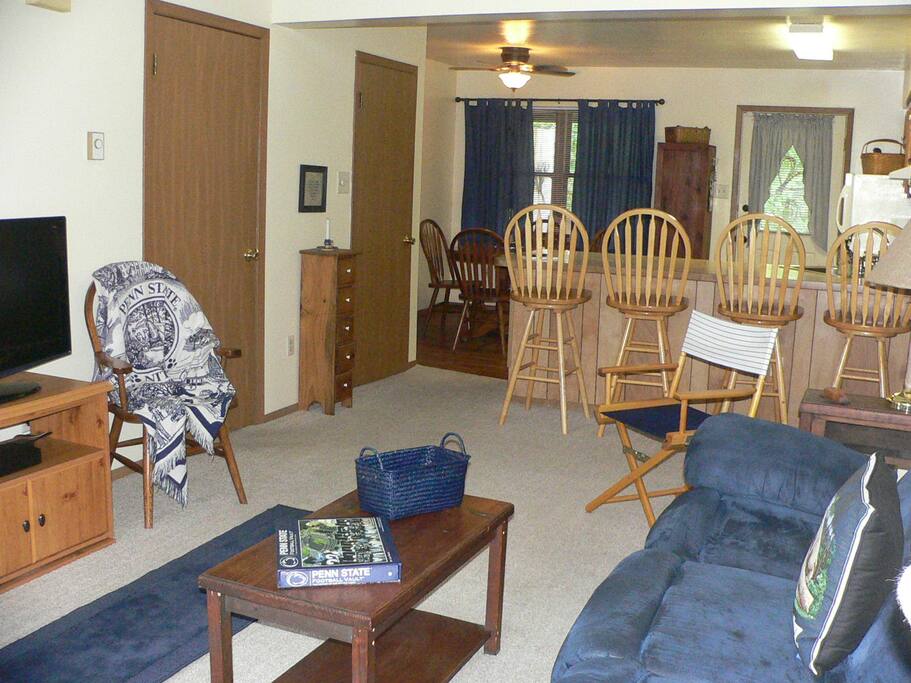 Kitchen table has a leaf to seat six plus four counter chairs