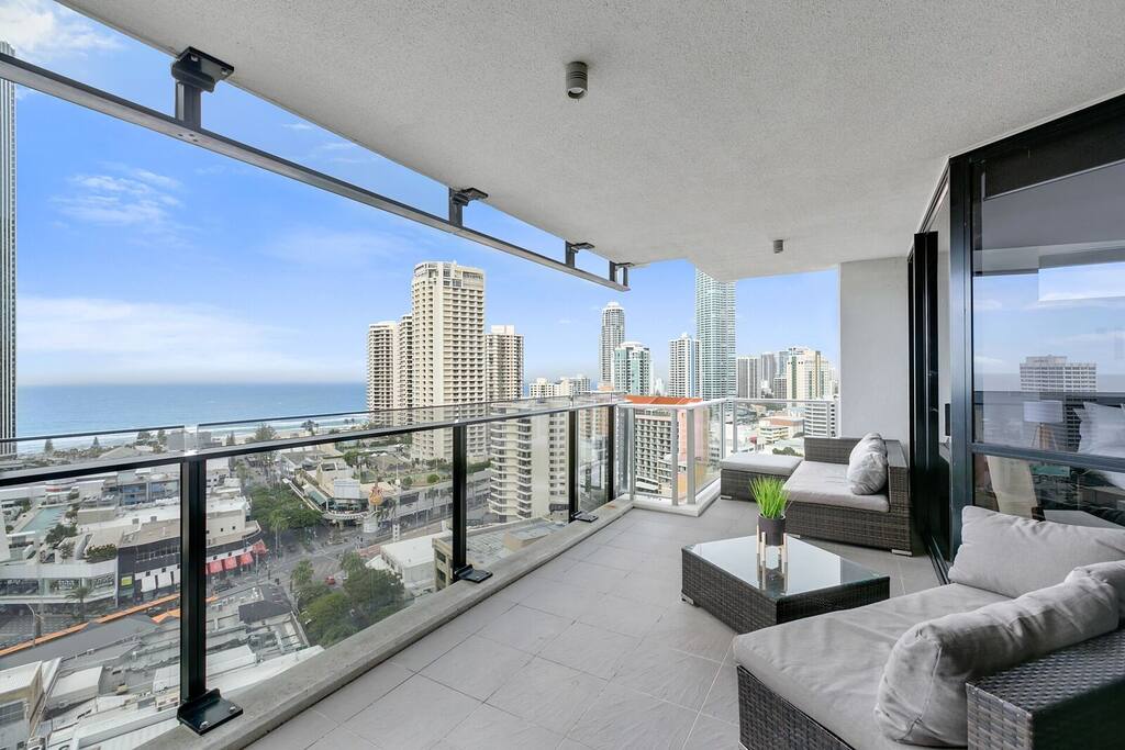 Large balcony with outdoor setting
