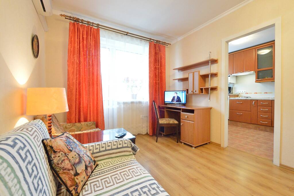 Living room with open door to the kitchen