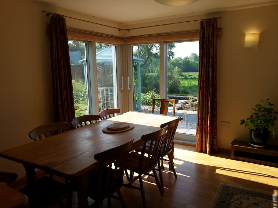 Dining room overlooking the garden with doors onto the patio