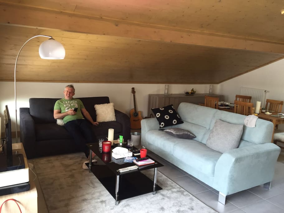 Sitting room, two sofas. TV, DVD, Apple TV, Bowers & Wilkins sound system, dining room table and 6 chairs