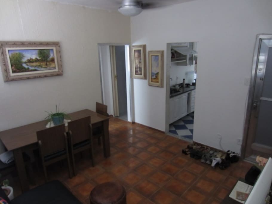 Living room view with access to kitchen, bathroom and rooms corridor.