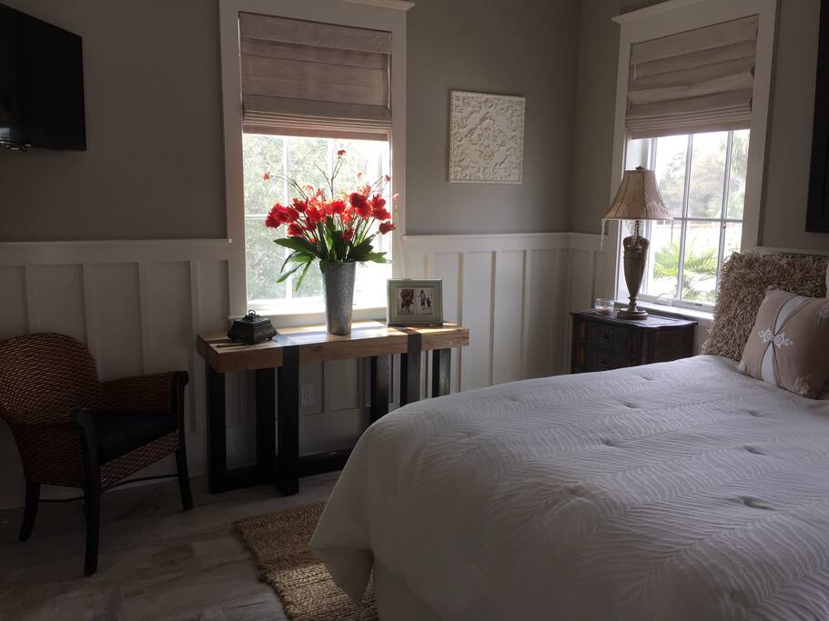 Queen size bed with TV