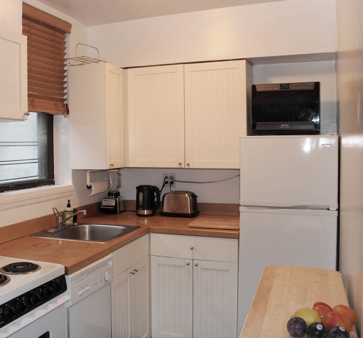 convenient kitchen with all amenities including Nespresso (not shown)