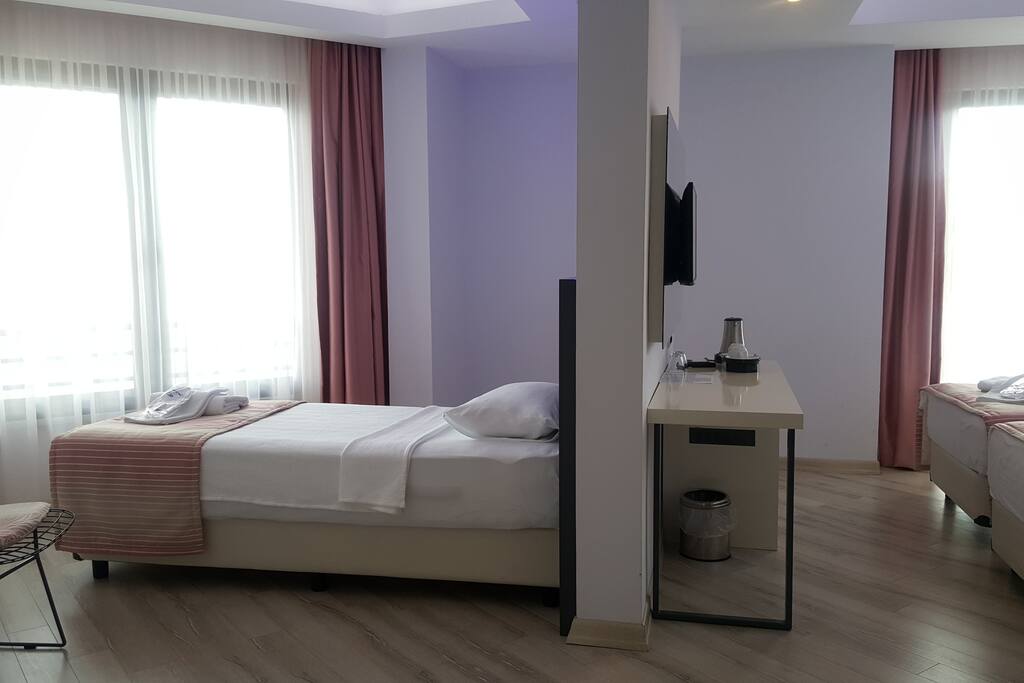 One twin bed on the other side of the room