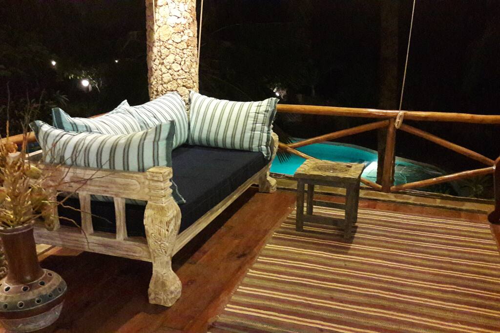 One of the confortable sofas of the living area on the first floor
