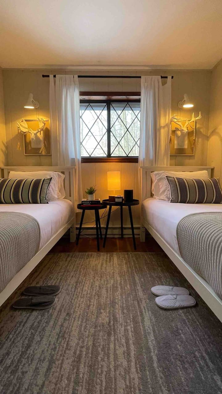 Twin bedroom view with Patience Elk on left side and and Fortitude Deer on the right side of the bedroom